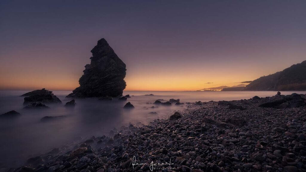 Puesta de sol playa larga exposición