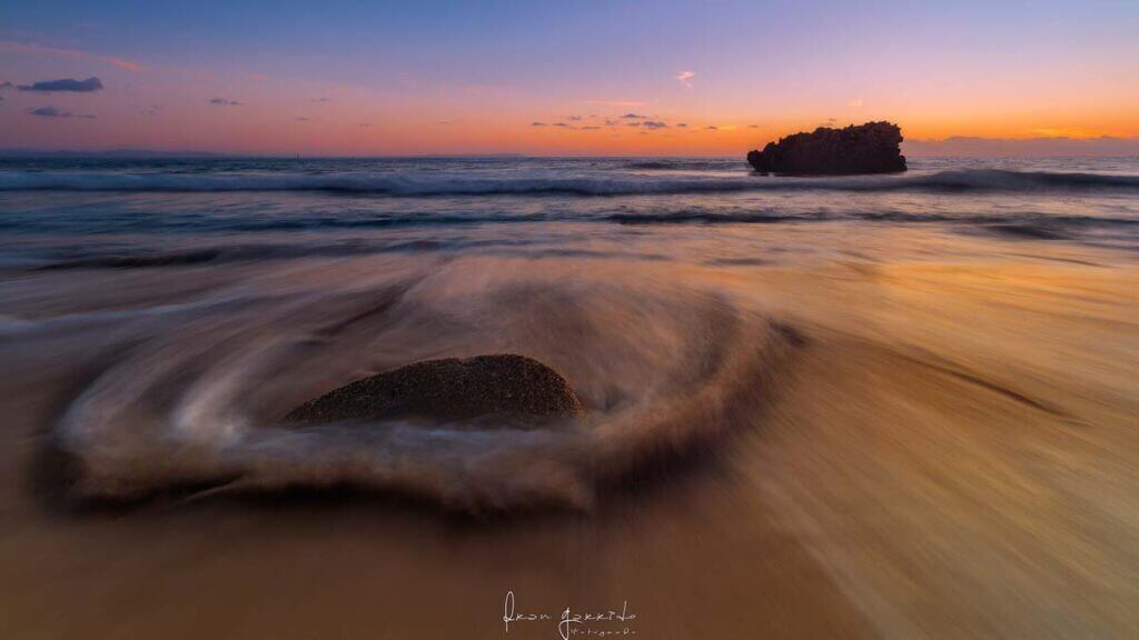 Atardecer playa larga exposición